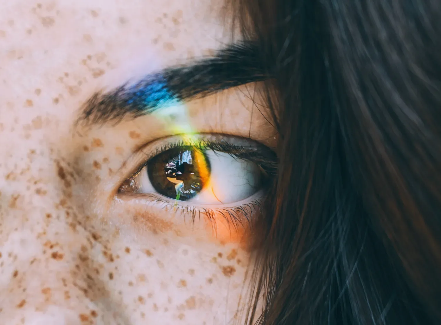 detail photo of a person's eye reflecting light