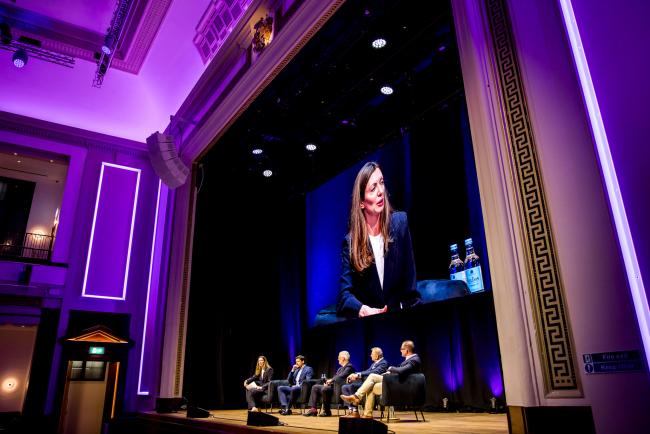 Demaris Mills moderates a panel at the 2026 Danaher Summit